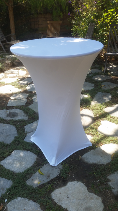 Highboy cocktail table with white spandex table cover for rent.