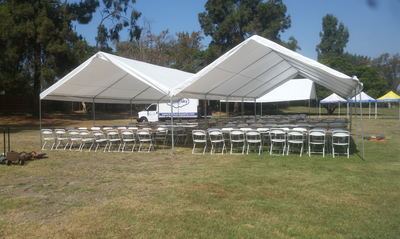 8 ft Rectangular Wood Table Rentals,. White Chairs and 20 x 40 Canopy Tents.