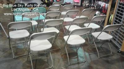Beige folding chair rentals for events in Los Angeles.
