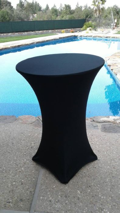 Highboy cocktail table with spandex table cover rental.