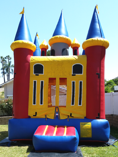 Inflatable Magic Bounce House Rental - Exterior view in backyard setup